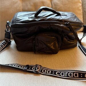 Caraa Black Duffel Bag with Adjustable Strap and Glossy Finish